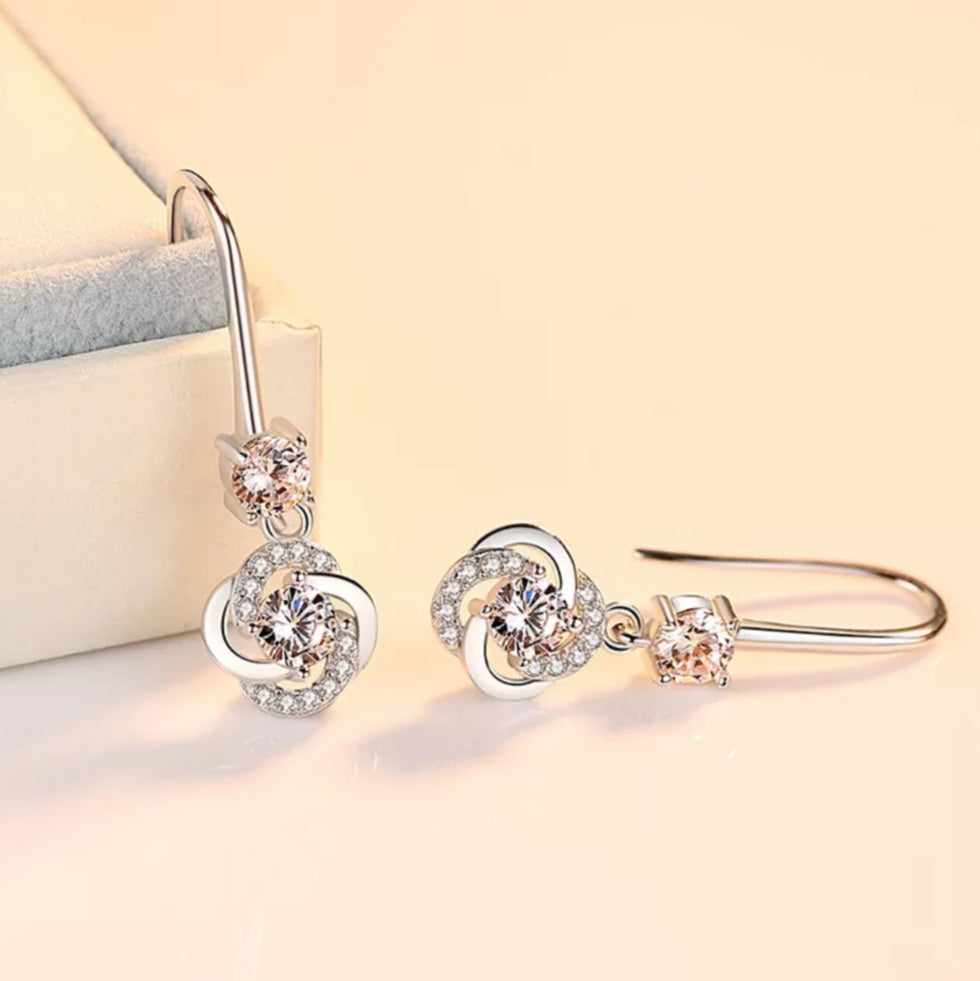 925 Sterling Silver Hollow Swirl Earrings