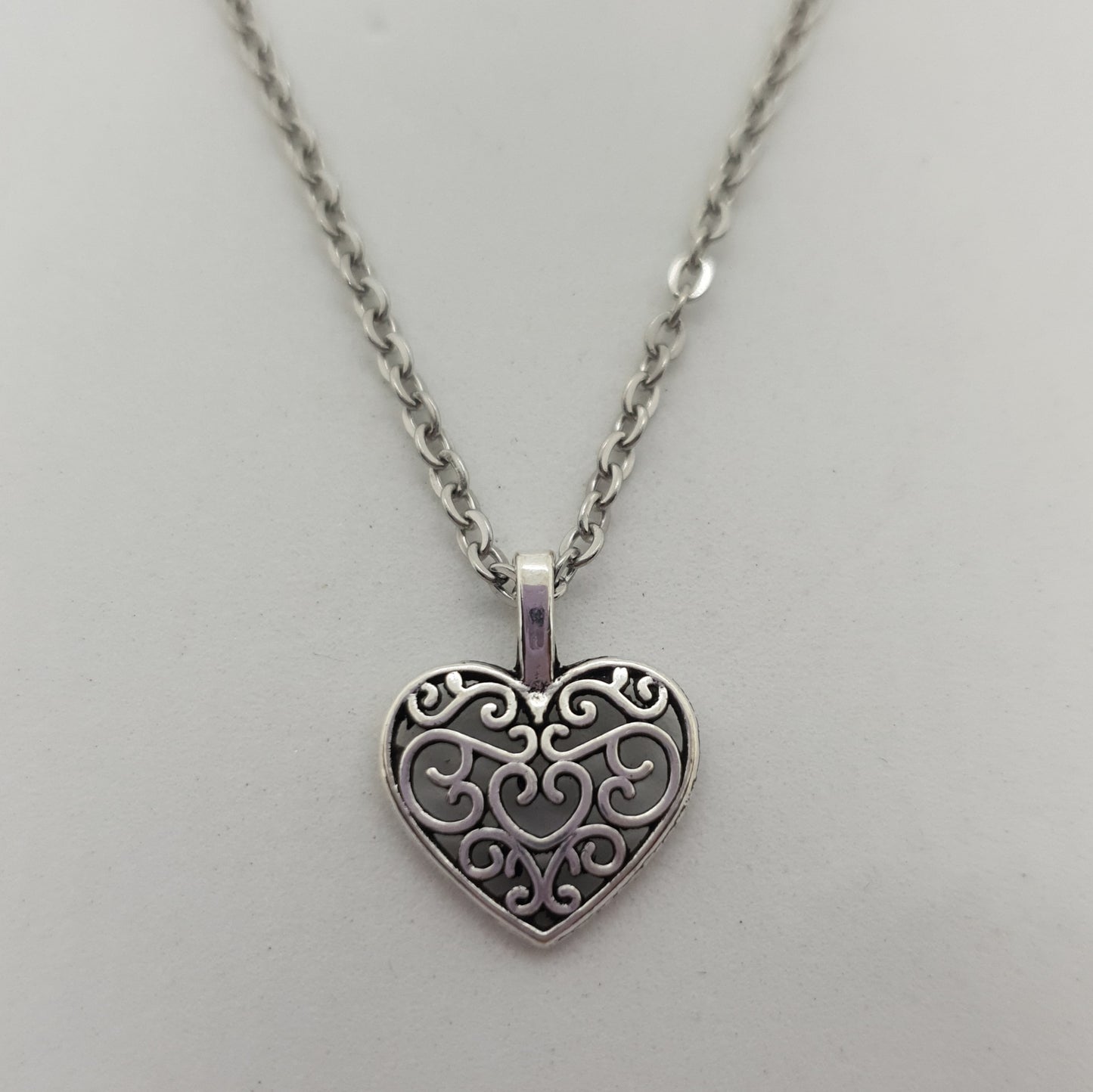 Silver Hollow Cut Hearts Necklace