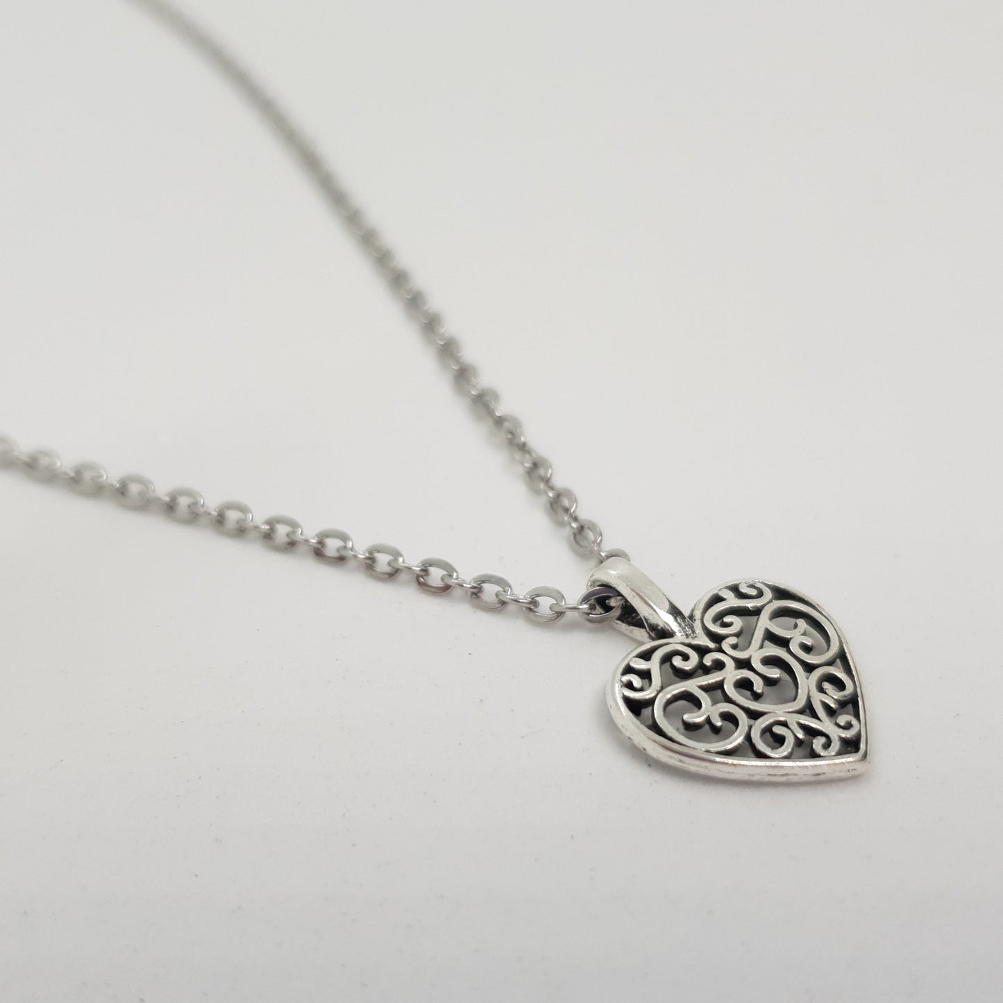 Silver Hollow Cut Hearts Necklace